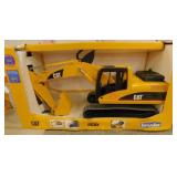 New Caterpillar excavator toy in box