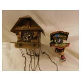 2 wooden cuckoo clocks, 1 needs weights, untested