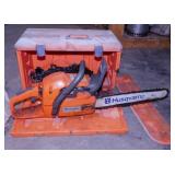 Husqvarna 345 gas chainsaw in plastic case with