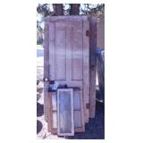 7 antique wooden doors - 4 wood framed windows
