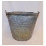 Galvanized farm water bucket