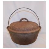 # 8 cast iron dutch oven w/ self basting lid &