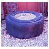 Custom made concrete tire tractor truck bed
