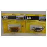 2 new 1999 Norscot CAT Caterpillar implements on