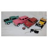 4 plastic built model cars