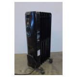 Oil radiator space heater on casters, works