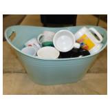 Plastic storage tub full of mugs