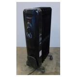 Oil radiator space heater on casters, works