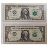 Two 2003 US one dollar star note bills