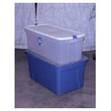 2 large storage totes w/ lids, largest is 34 gal.