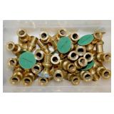 Several brass candlesticks, hammered brass vase &