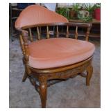 Vintage carved oak but chair w/ mauve upholstery