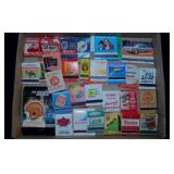 Large matchbook collection in glass fish bowl