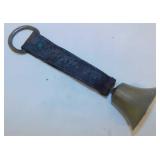 Antique brass livestock bell on leather strap