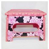 Pink plastic folding child