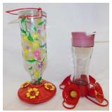 2 glass bottle hummingbird feeders