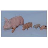 4 vintage toy pig figurines, 2 marked Germany,