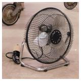 2 small adjustable floor fans on stands