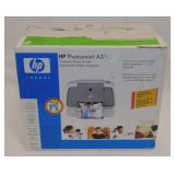HP Photosmart A310 compact photo printer, prints
