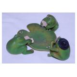 Frogs playing cards on lily pad marked Hong Kong -