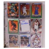Binder of 197 basketball cards in sleeves