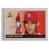 Box of mixed baseball cards: Yadier Molina -