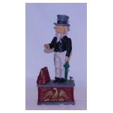 Cast iron mechanical Uncle Sam coin bank,