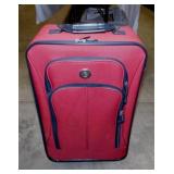 Rolling soft side carry-on luggage suitcase
