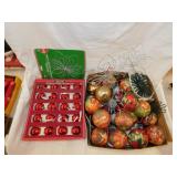 New box of red glass Christmas tree ornaments -