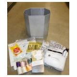 Aluminum waste can full of sewing supplies