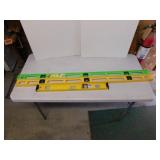 Two 24" plastic levels - Stanley 24" metal level