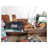 2" lumber in stack on south wall - 2 bags of