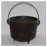 Antique cast iron 3 toed kettle w/ bail handle,