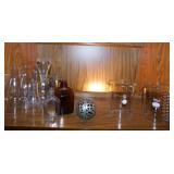 Pierced metal orb cage on chain - Pyrex glass