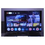 TCL 4K 43" smart TV television on stand w/