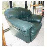 Nice large Hunter Green vinyl chair marked Italy,