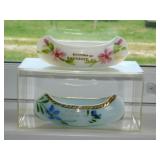 2 hand painted milk glass souvenir canoes: