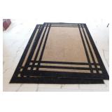 2 matching large patio / sunroom area rugs -