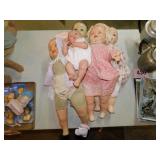 4 antique baby dolls
