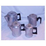 4 vintage aluminum coffee percolators, tallest is
