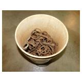 Bucket full of antique horse bits