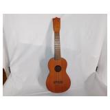 Vintage handcrafted ukulele or child