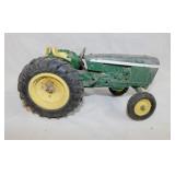 Toy John Deere tractor, 8" long