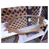 Oval framed mirror, some damage, 25" x 38"