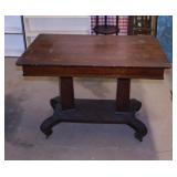 Oak one drawer library table on casters w/ double