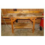 Heavy wooden shop/garage work table w/ power strip