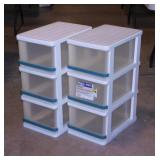 Two plastic 3 drawer storage units, 25" tall