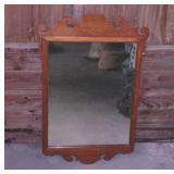Wood framed Colonial style wall mirror, 22" x 35"