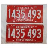 Two 1957 embossed metal Illinois license plates