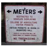 Retired metal University Parking No Trespassing